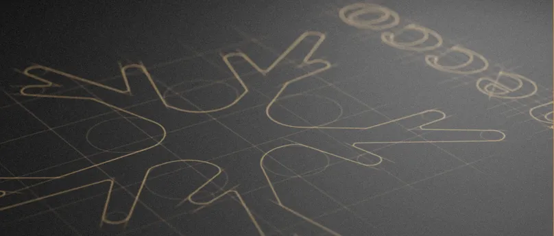 暗い紙に描かれたneccoのロゴの構造。